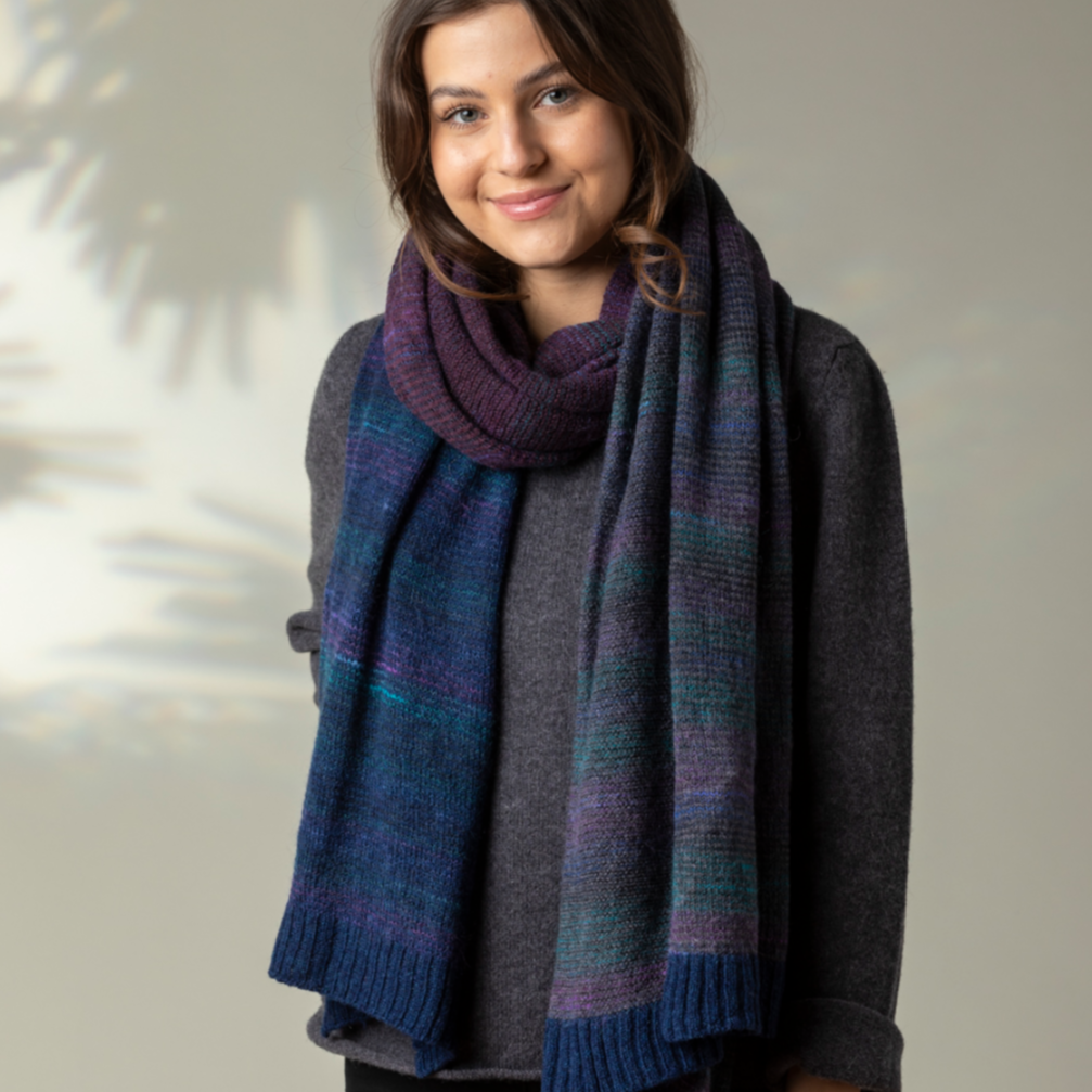 Eribe Treeline wrap in regatta. Warm and lightweight wool scarf and shawl in blues and purples.