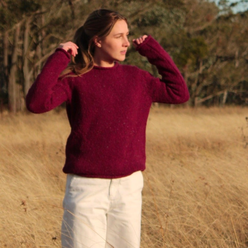 Fisherman out of Ireland women’s sweater. Rolled Edge Tunic in Berry.