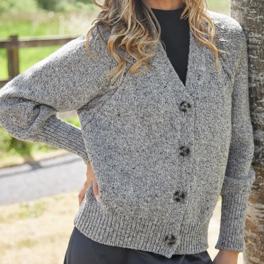 Warm merino wool cardigan for women in grey fleck donegal tweed. Fisherman Out of Ireland.