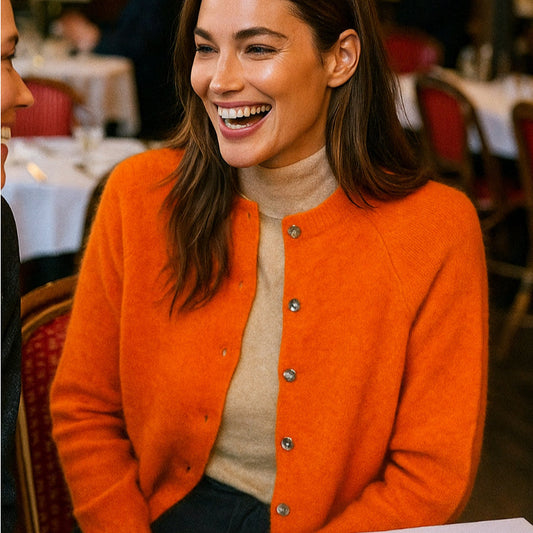 Orange wool cardigan from Harley of Scotland.
