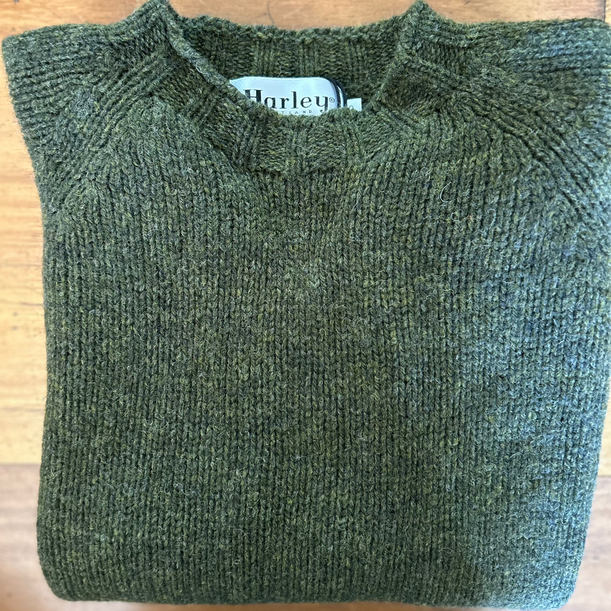 quality mens thick wool jumper in green. Scottish Knitwear.