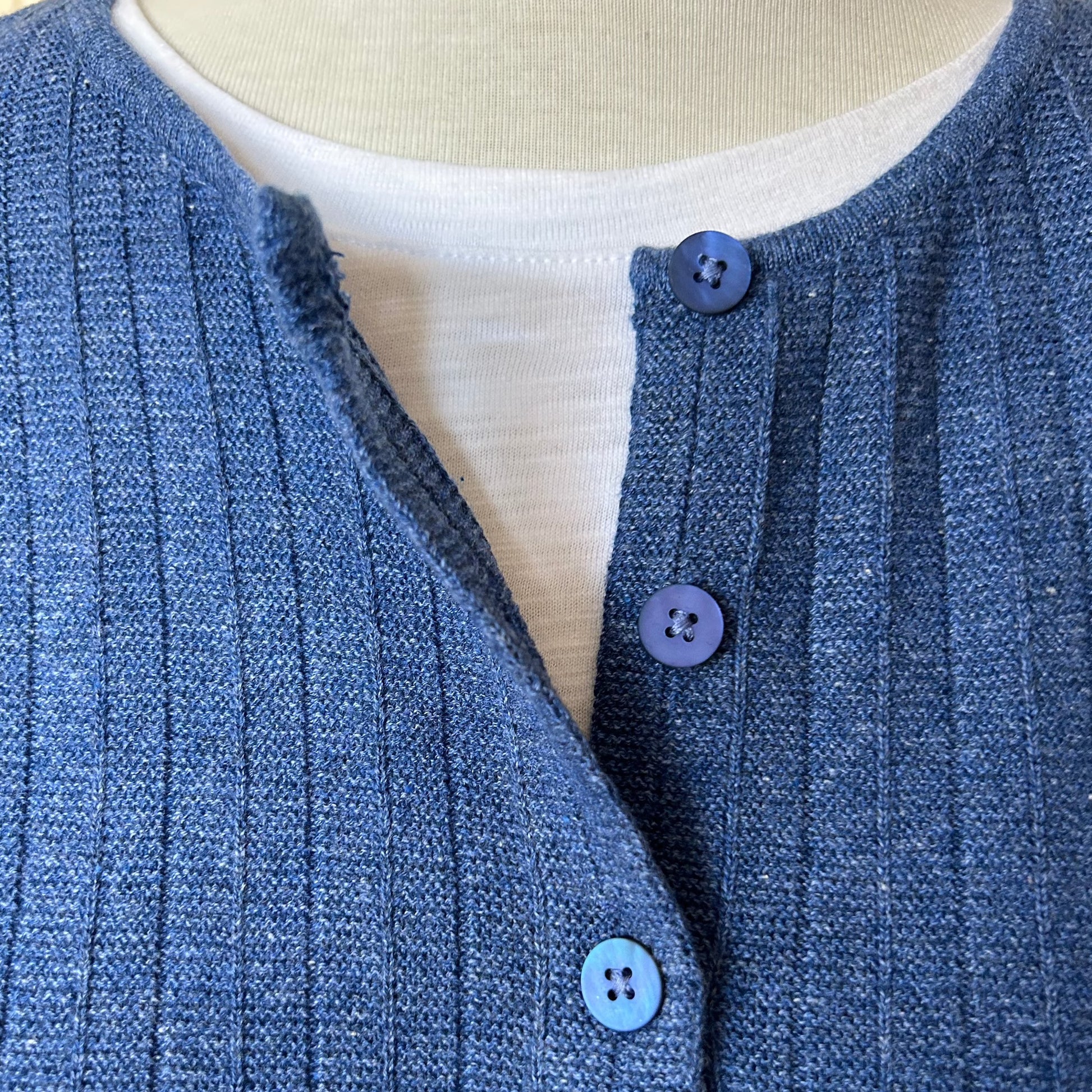 Danish design knitwear. From Charlotte Mansted a ribbed cotton cardigan in blue. Eco cotton.