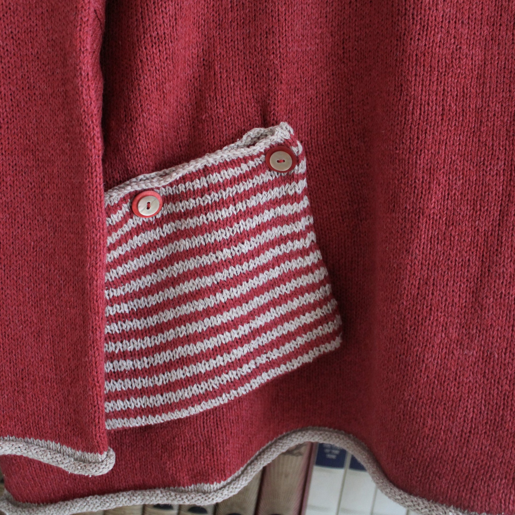 Detail of Home made tunic knitwear.