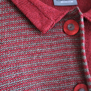 Hand dyed buttons on striped knitted jacket.