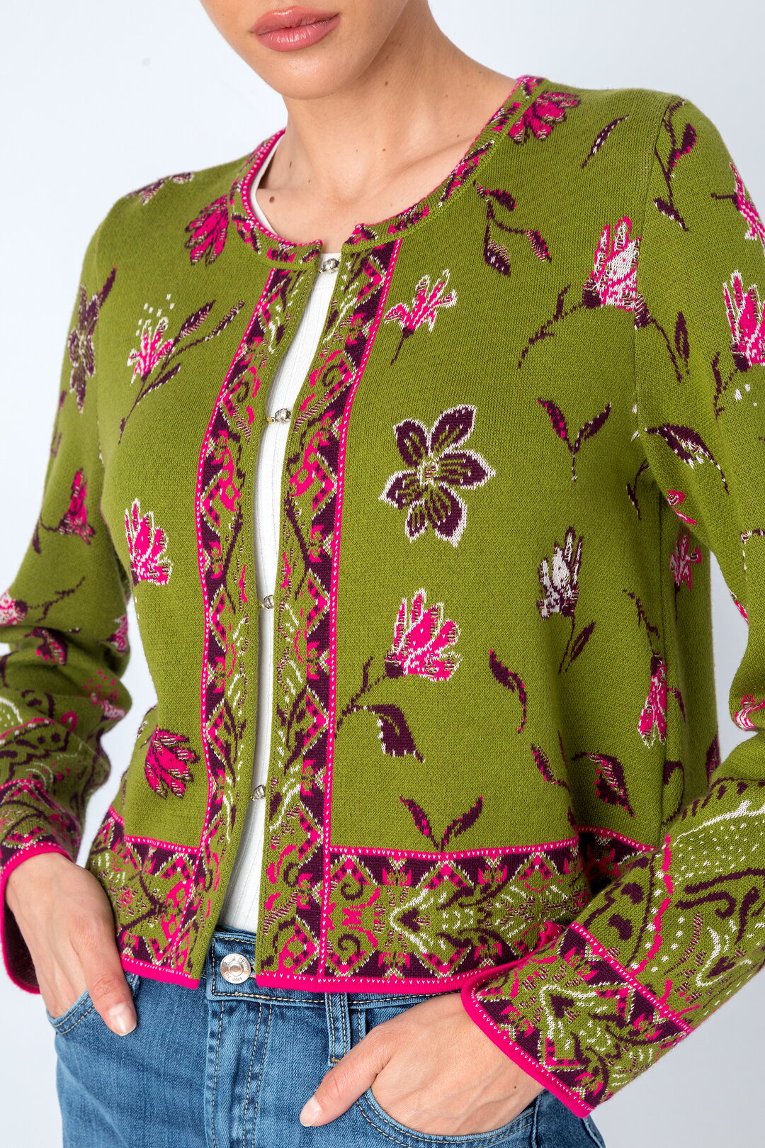 IVKO's latest cardigan with ornament flower pattern in green, close up of knitwear