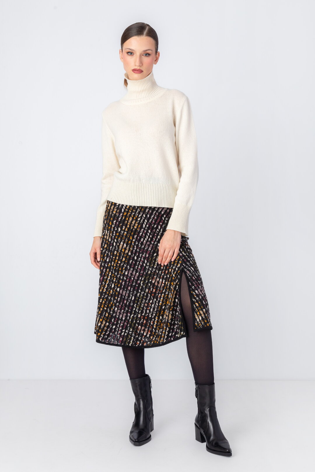 IVKO's Knitted Skirt, styled with tights and boots