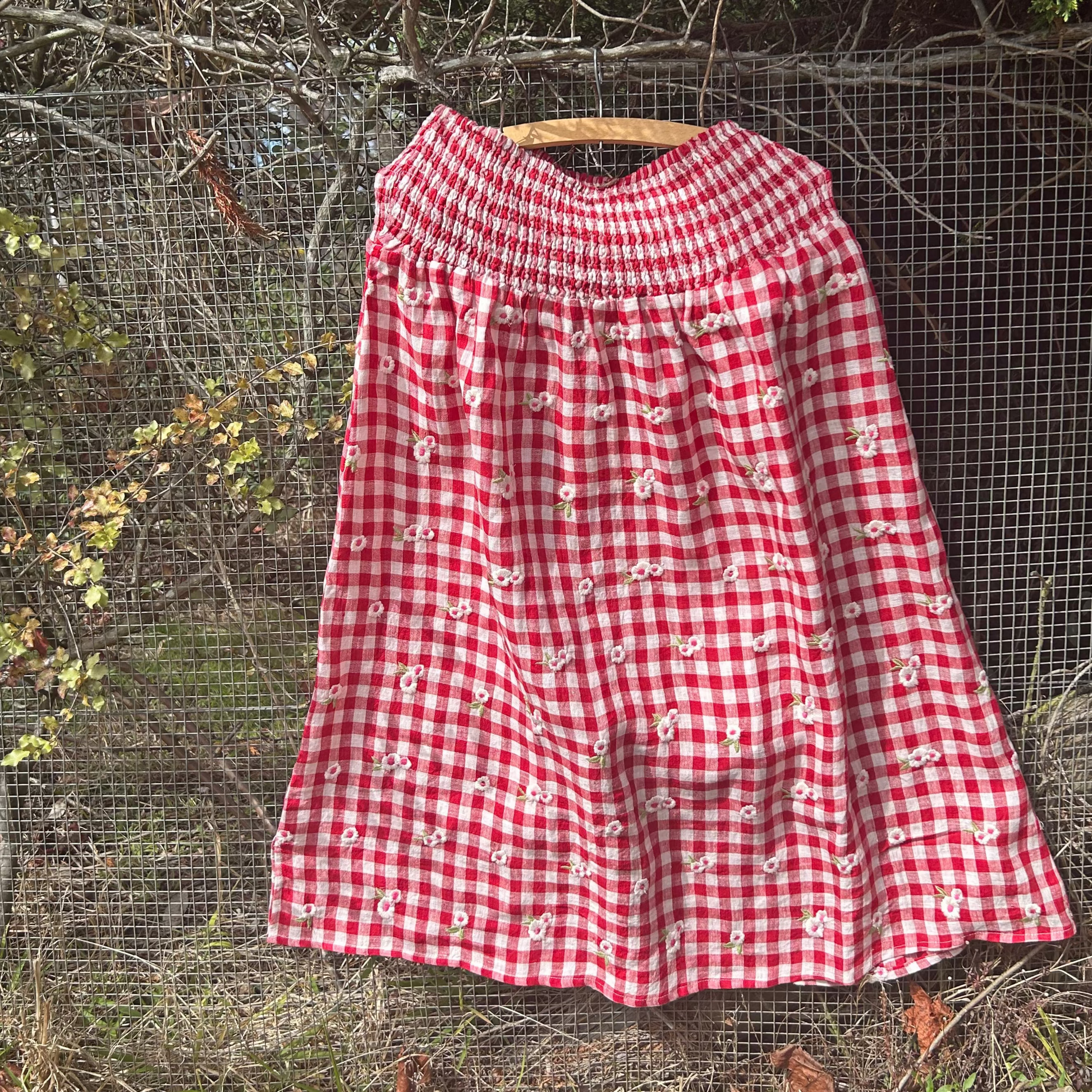 Mandalay Designs - red gingham embroidered linen.