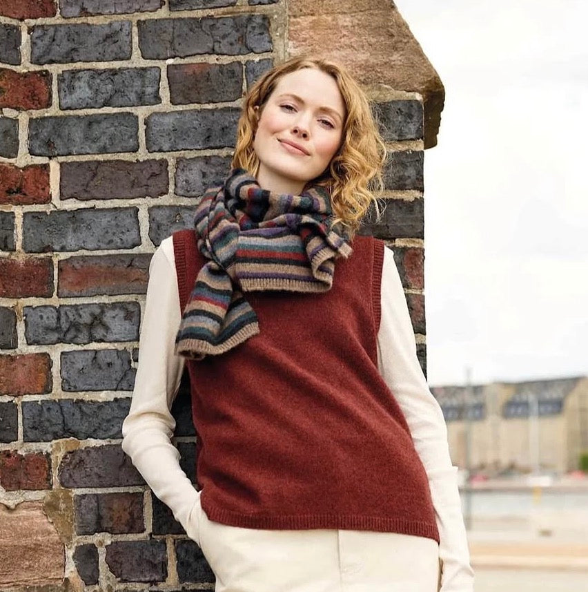 Mansted Mitos vest in rust with Mansted striped yak scarf zett