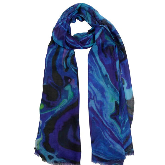 Blue and green patterned scarf on a white background