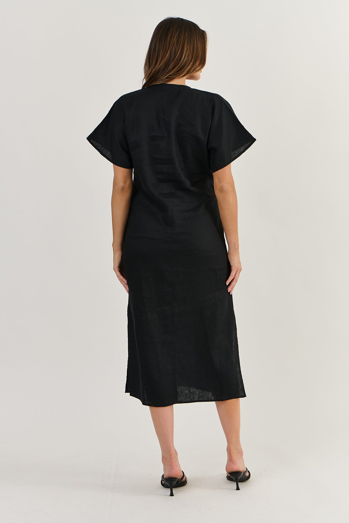 Black linen dress elegant.