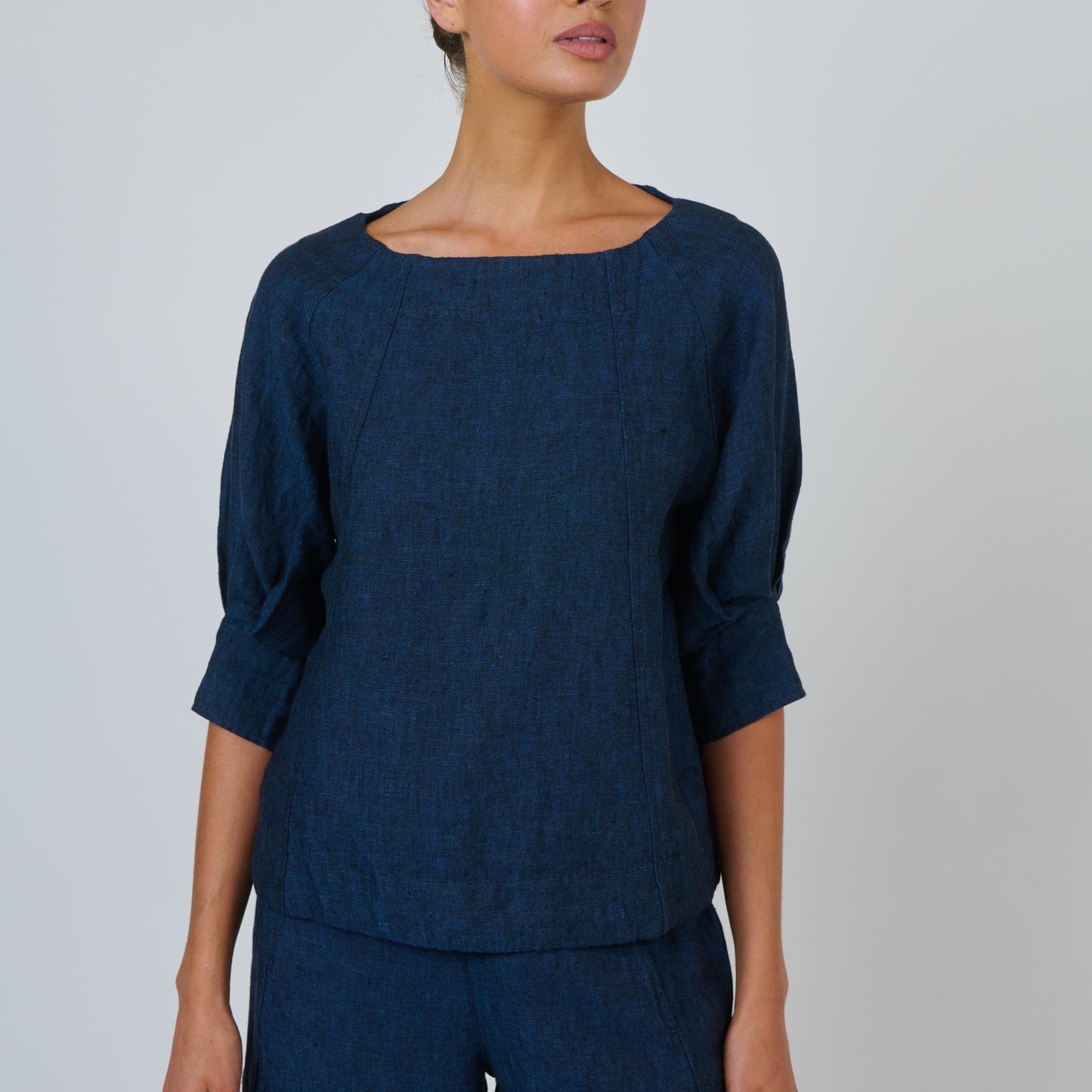 Naturals by O&J Navy linen top with 3/4 cuffed sleeves and boat neck
