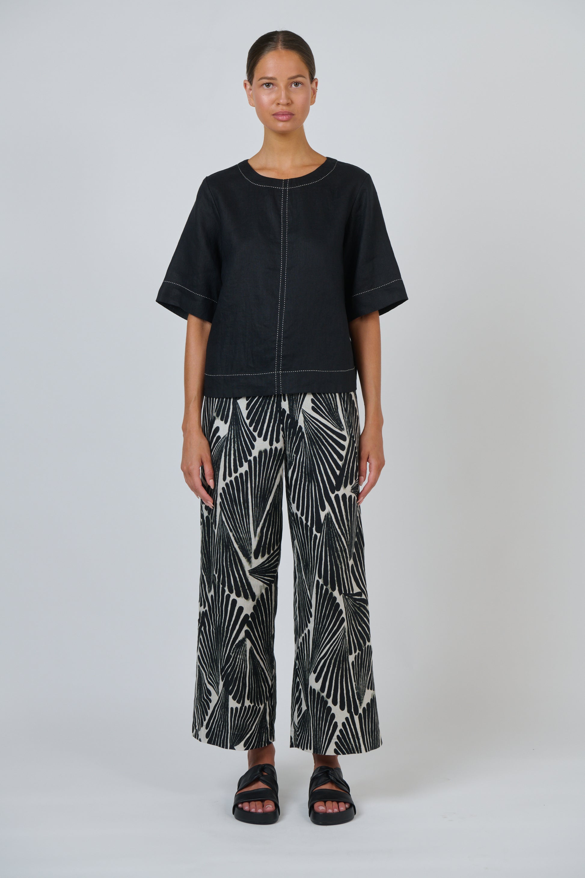 Naturals By O&J Black Linen top with White Stitching.