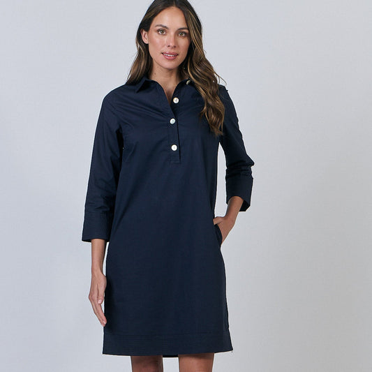 Naturals by O&J a polplin dress in navy with big buttons.