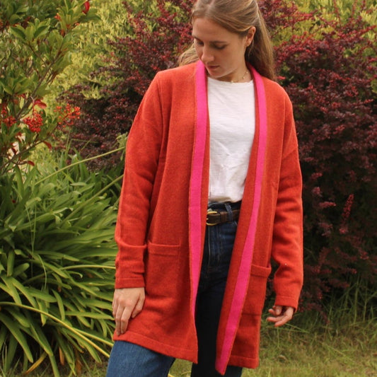 Long edge to edge cardigan in orange from nature of knitwear