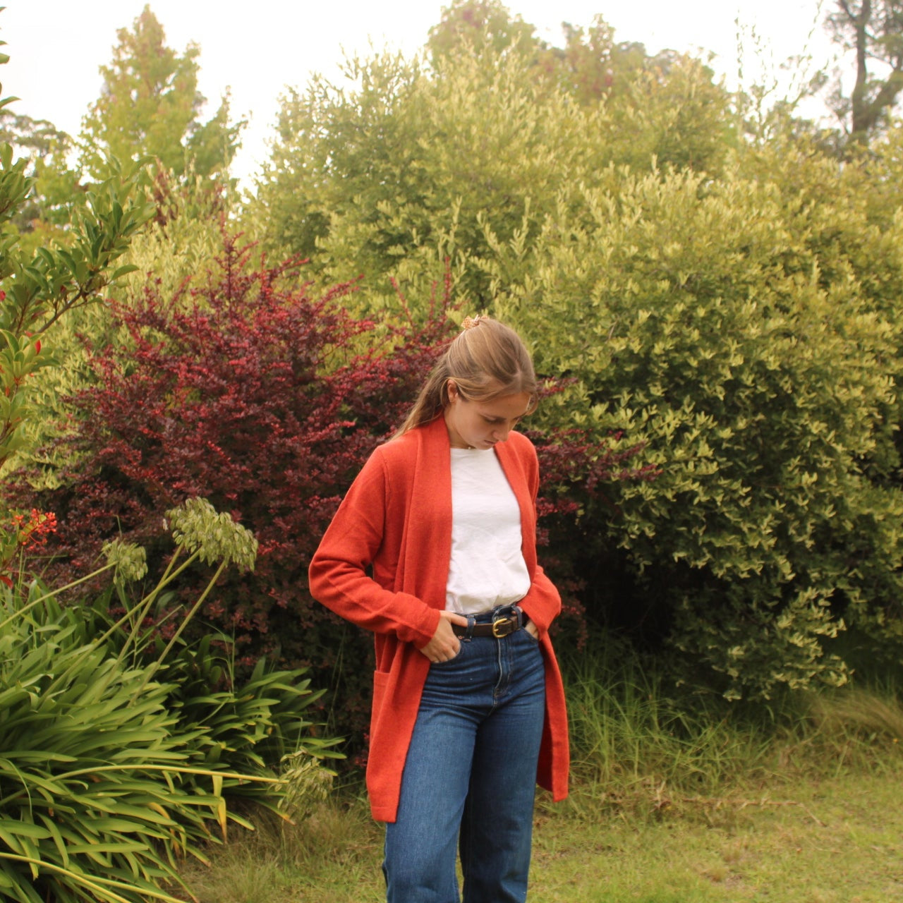 Long edge to edge cardigan in orange from nature of knitwear 
