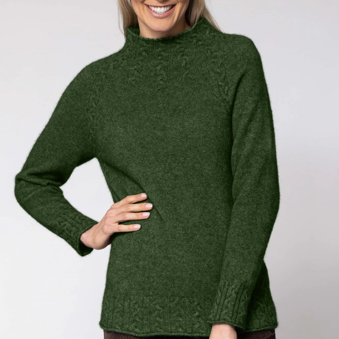 Quality possum and merino wool knitwear. Noble Wilde funnel neck in Jungle.