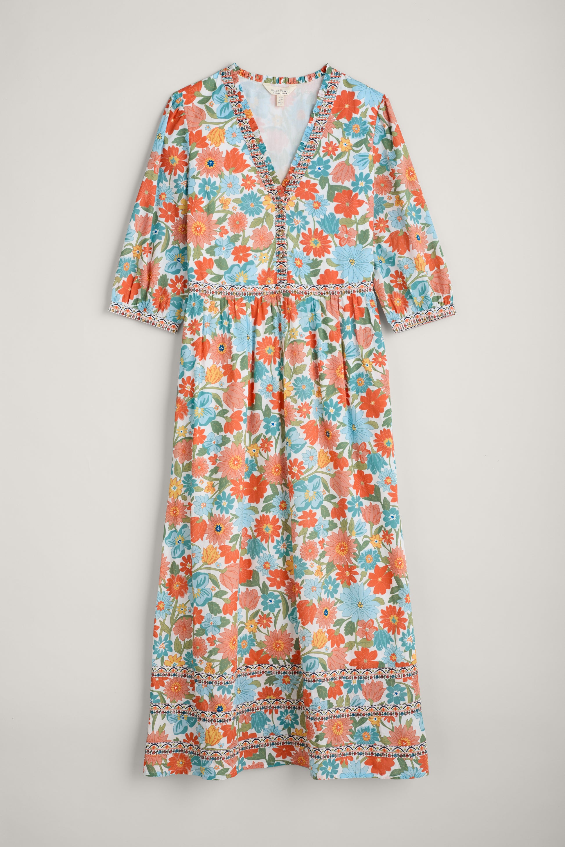 SEASALT's Blue Hills Border Dress in Flowering Blooms Chalk, flat lay of summer dress