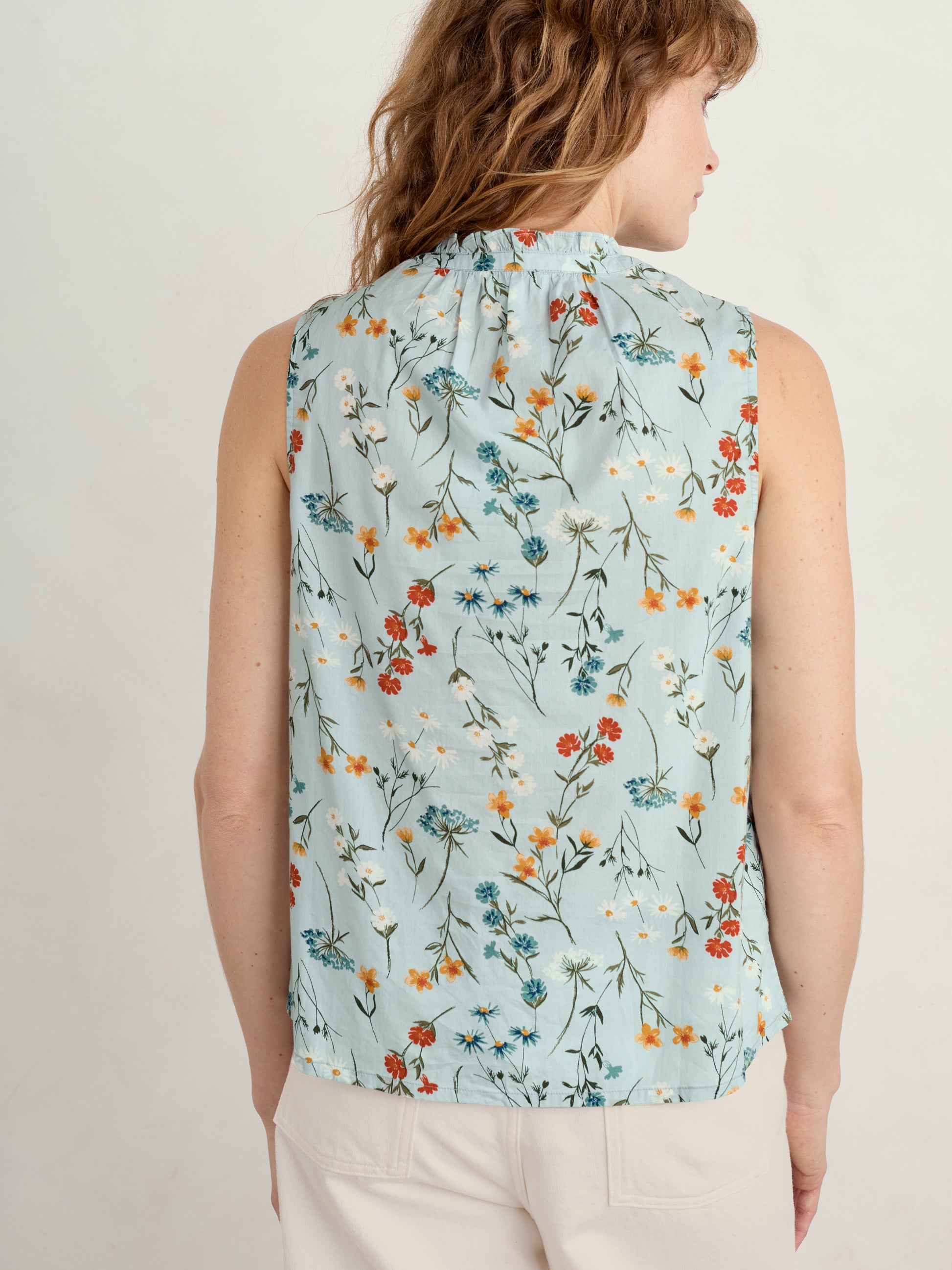 SEASALT's Flower Fields Vest in Wildflower Stems Reflection, back view of vest top