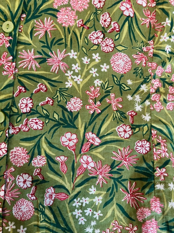 SEASALT's Larissa Shirt in Campion Field Dill, close up of green and pink floral fabric