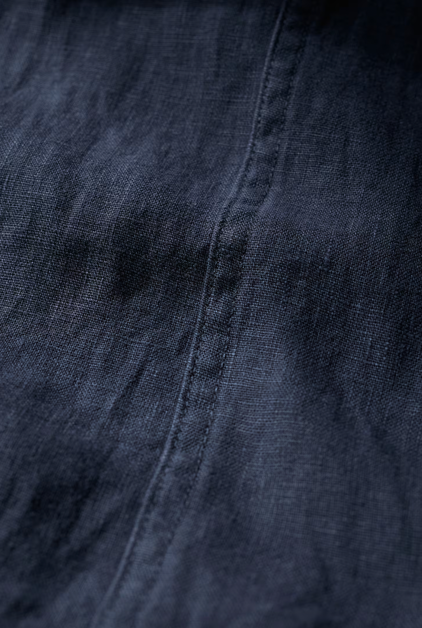 SEASALT's Poleacre Cropped Linen Trousers in Maritime, close up of linen