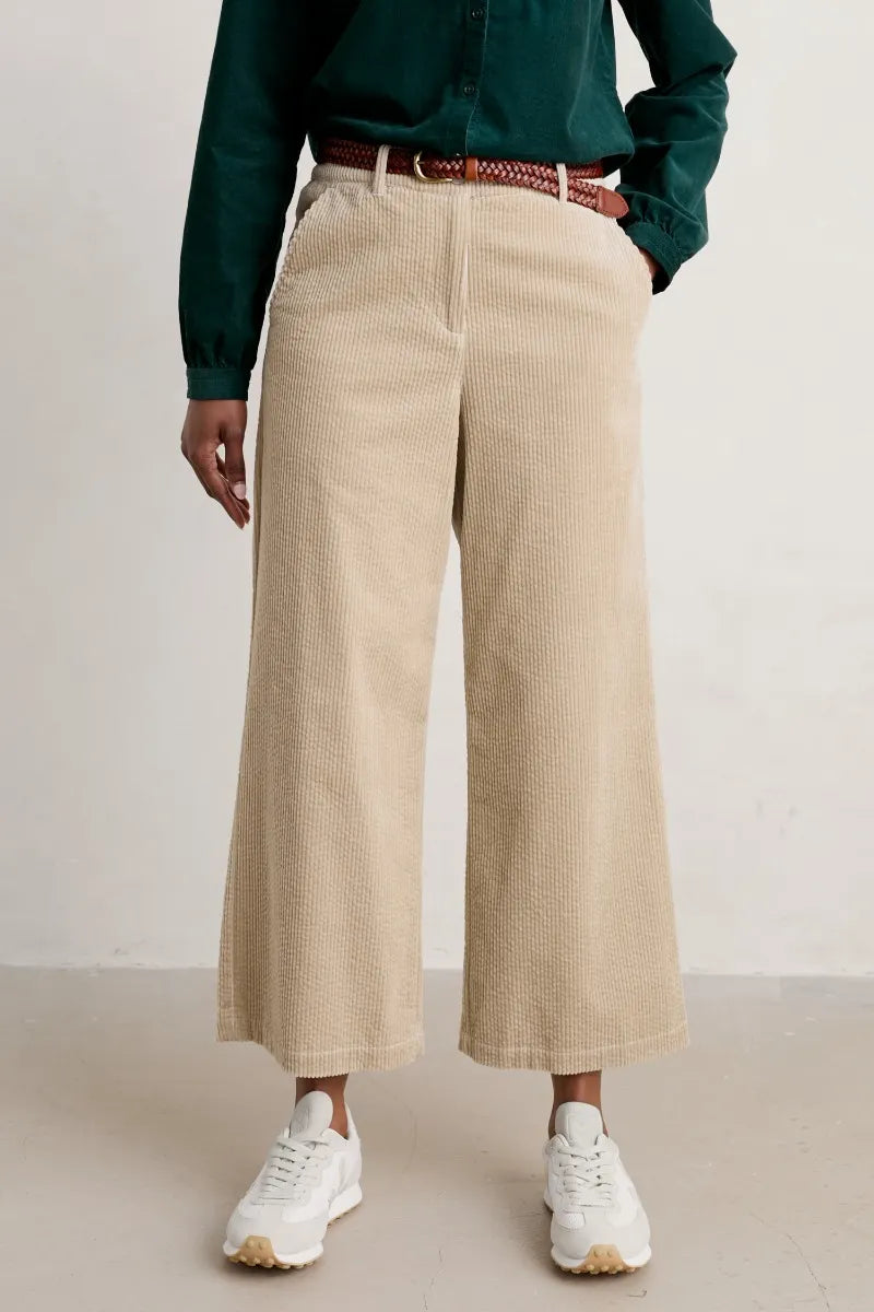 SEASALT's Asphodel Trousers in Birch, cotton cord styled with sneakers and jumper