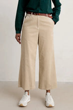 SEASALT's Asphodel Trousers in Birch, cotton cord styled with sneakers and jumper