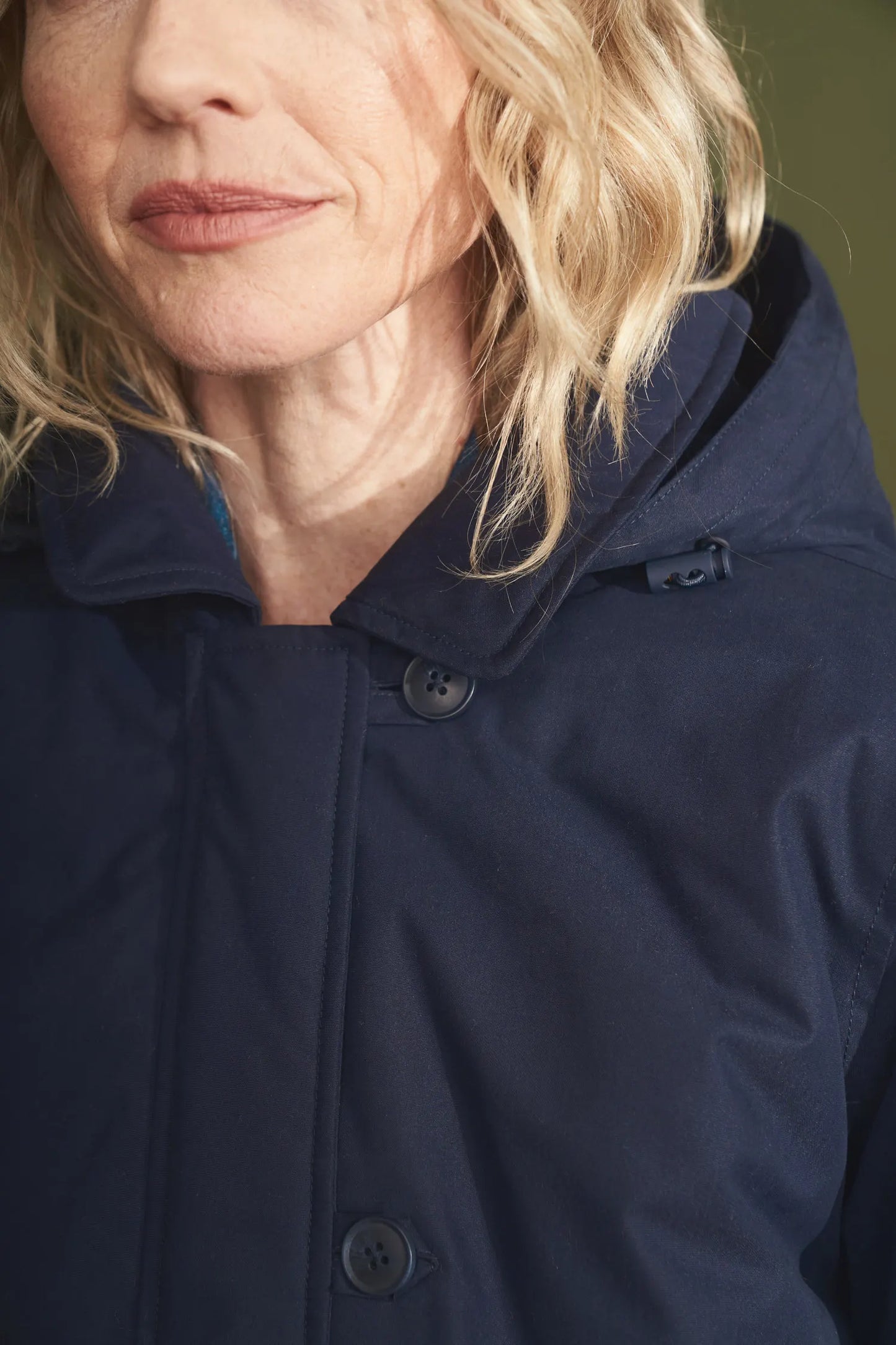 SEASALT's Forecastle Jacket in Dark Night, close up of zip and buttons