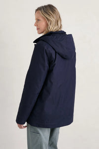 SEASALT's Forecastle Jacket in Dark Night, back view with hood