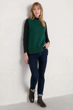 SEASALT's Landing Top Onyx, long sleeve top styled with vest and jeans