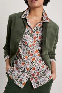 SEASALT's Larissa Shirt in Folklore Bloom Aran, with green blazer and trousers