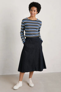 SEASALT's Sailor Shirt in Tri Mini Cornish Cornflower, styled with black skirt and white sneakers