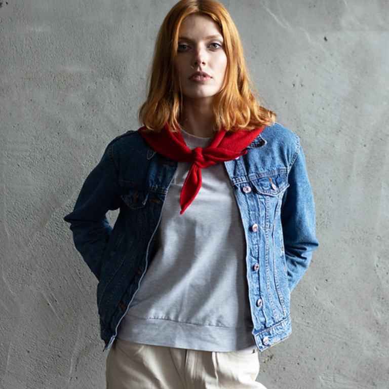 Red knitted triangle scarf for women.