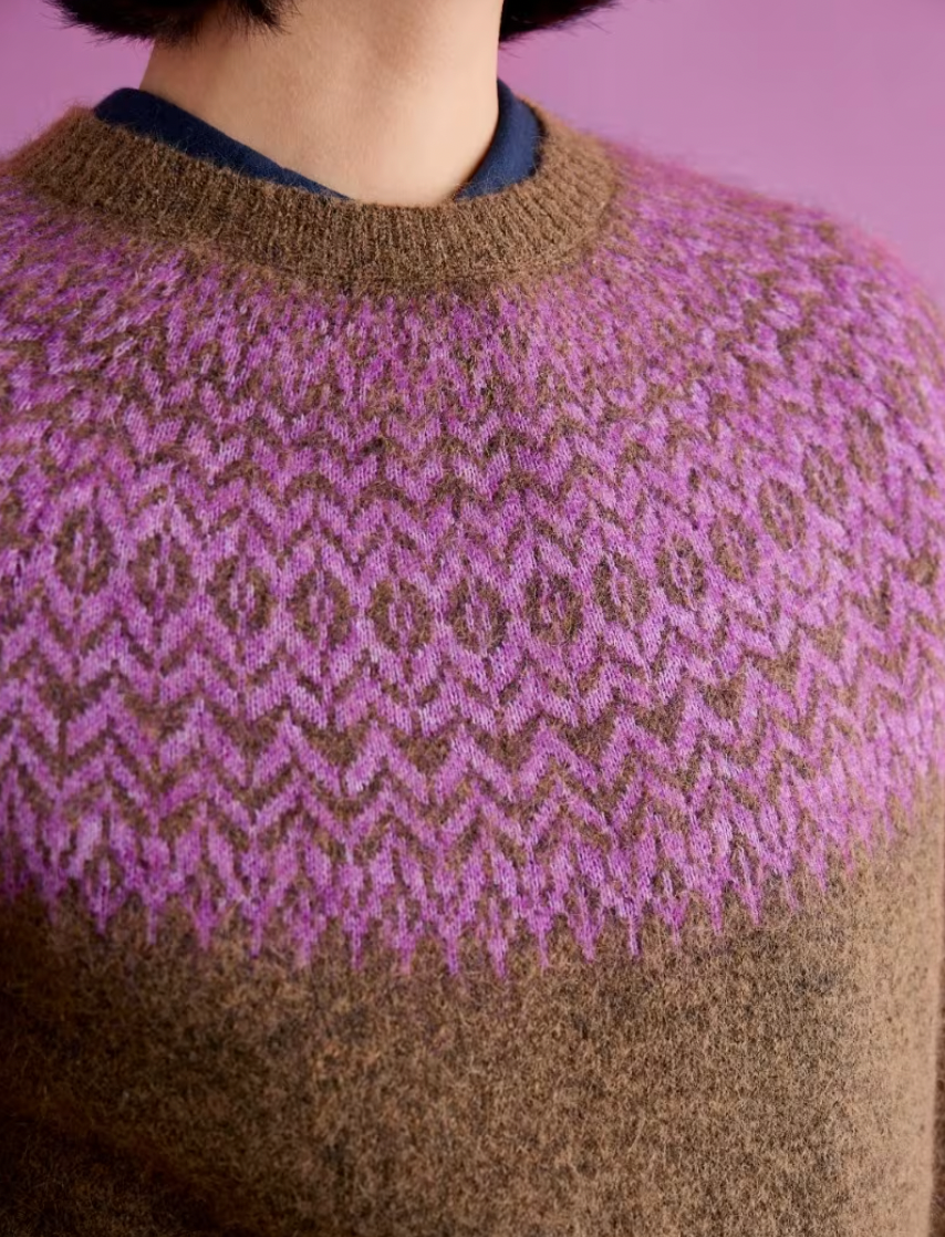 Close up of SEASALT's Spruce Frost Jumper, in Hellebore Gully Wild Orchid, Fair Isle pattern