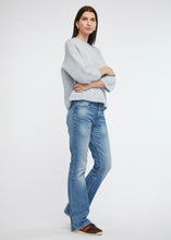 Zaket and Plover's Cosy Crew Jumper in Iceberg, blue sweater styled with jeans