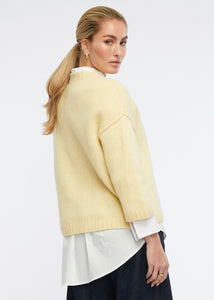 Zaket and Plover's Cosy Crew Jumper in Lemon, back view of ladies yellow jumper