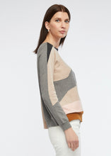 Zaket and Plover's wave jumper in oat, side view of women's sweater