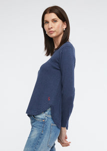 Zaket and Plover's Essential Shirt Bottom in denim, side view with embroidered logo