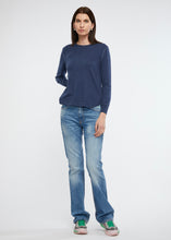 Zaket and Plover's Essential Shirt Bottom in denim, styled over jeans and sneakers for casual look