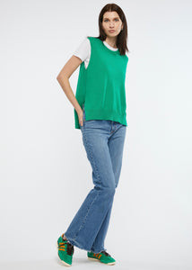 Zaket and Plover's Essential Vest in Emerald, styled with white tee and jeans