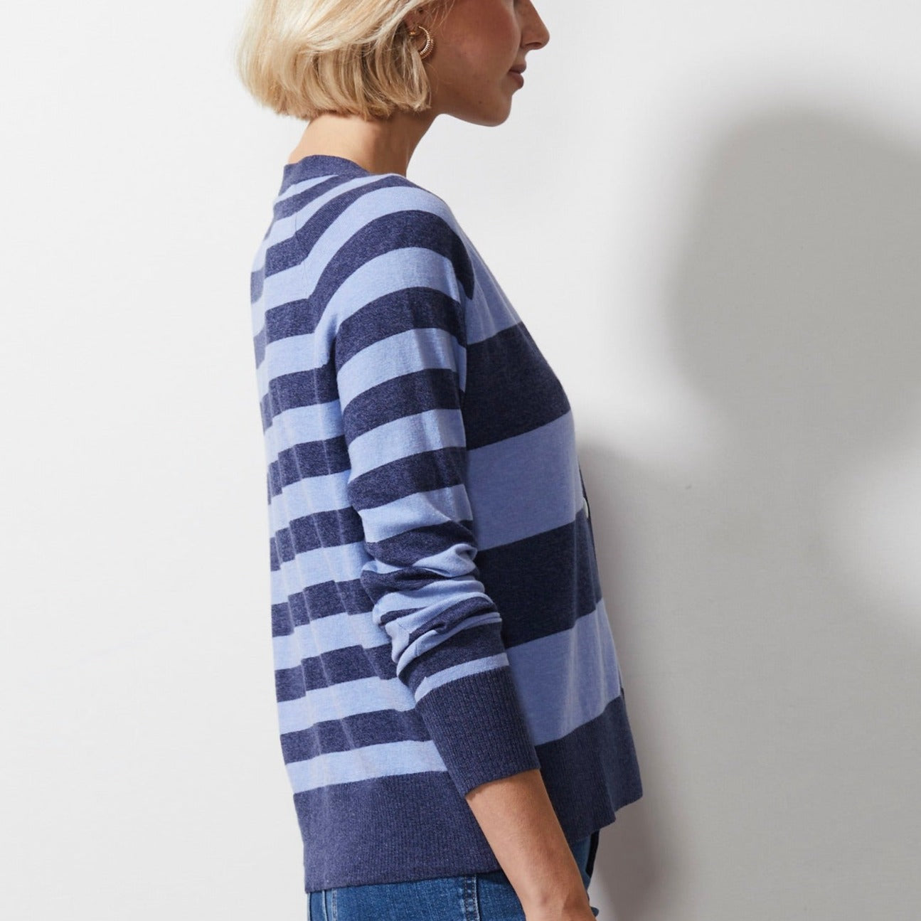 Woman wearing Zaket and Plover's Multi Stripe Cardi in denim