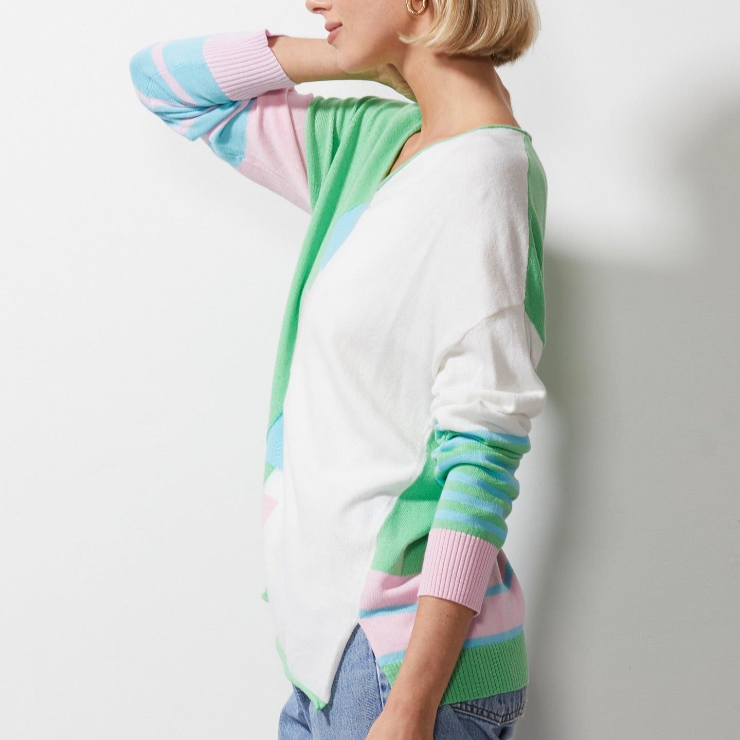 Woman wearing Zaket and Plover's Intarsia squares jumper in butterfly