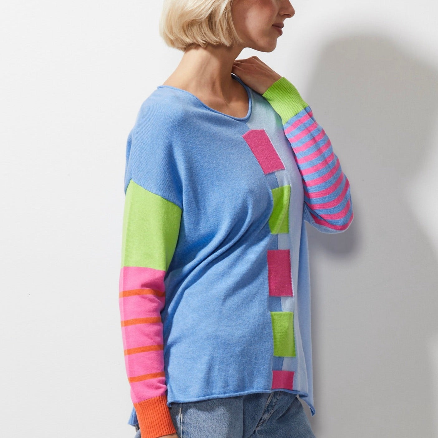 Woman wearing Zaket and Plover's Intarsia squares jumper in chambray