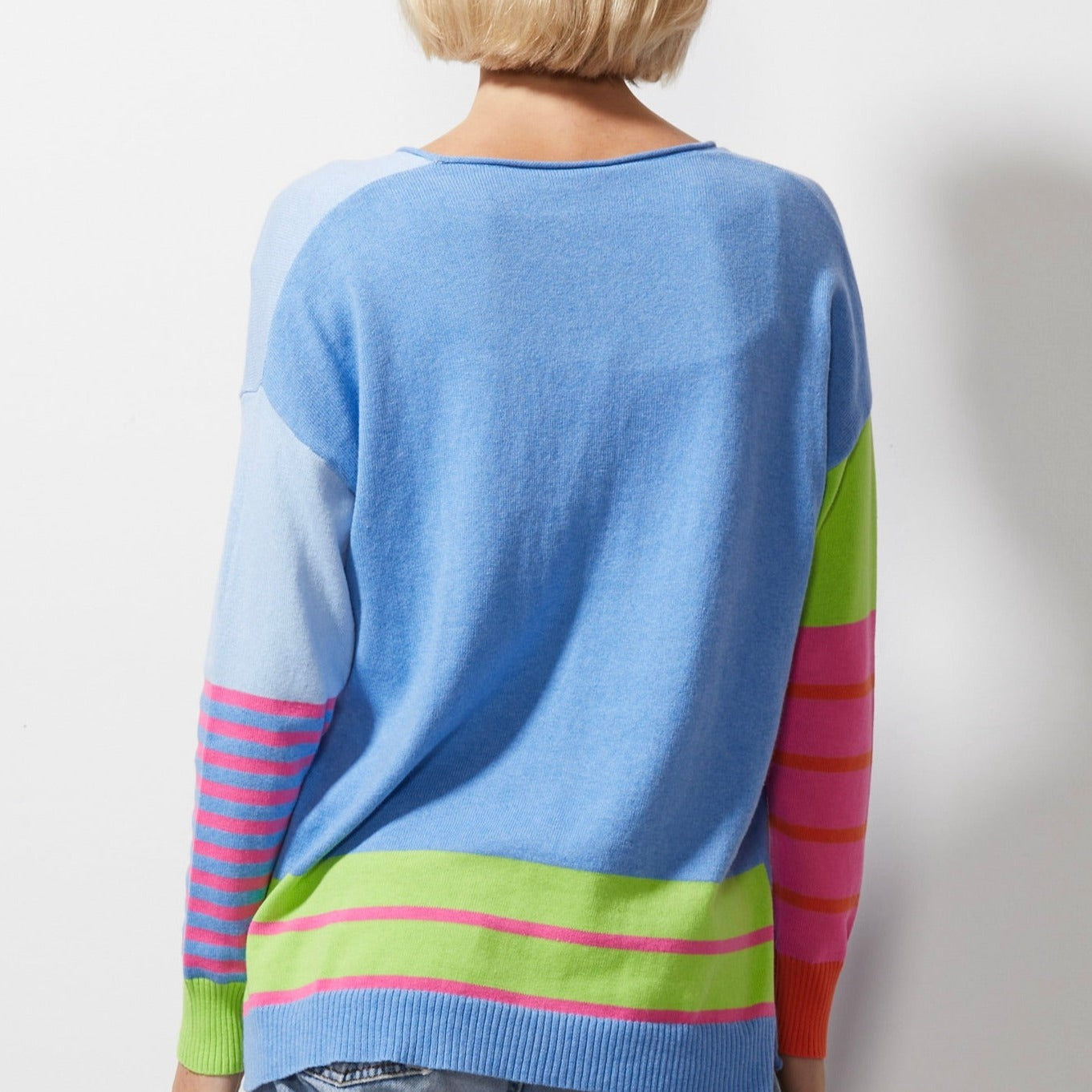 Woman wearing Zaket and Plover's Intarsia squares jumper in chambray