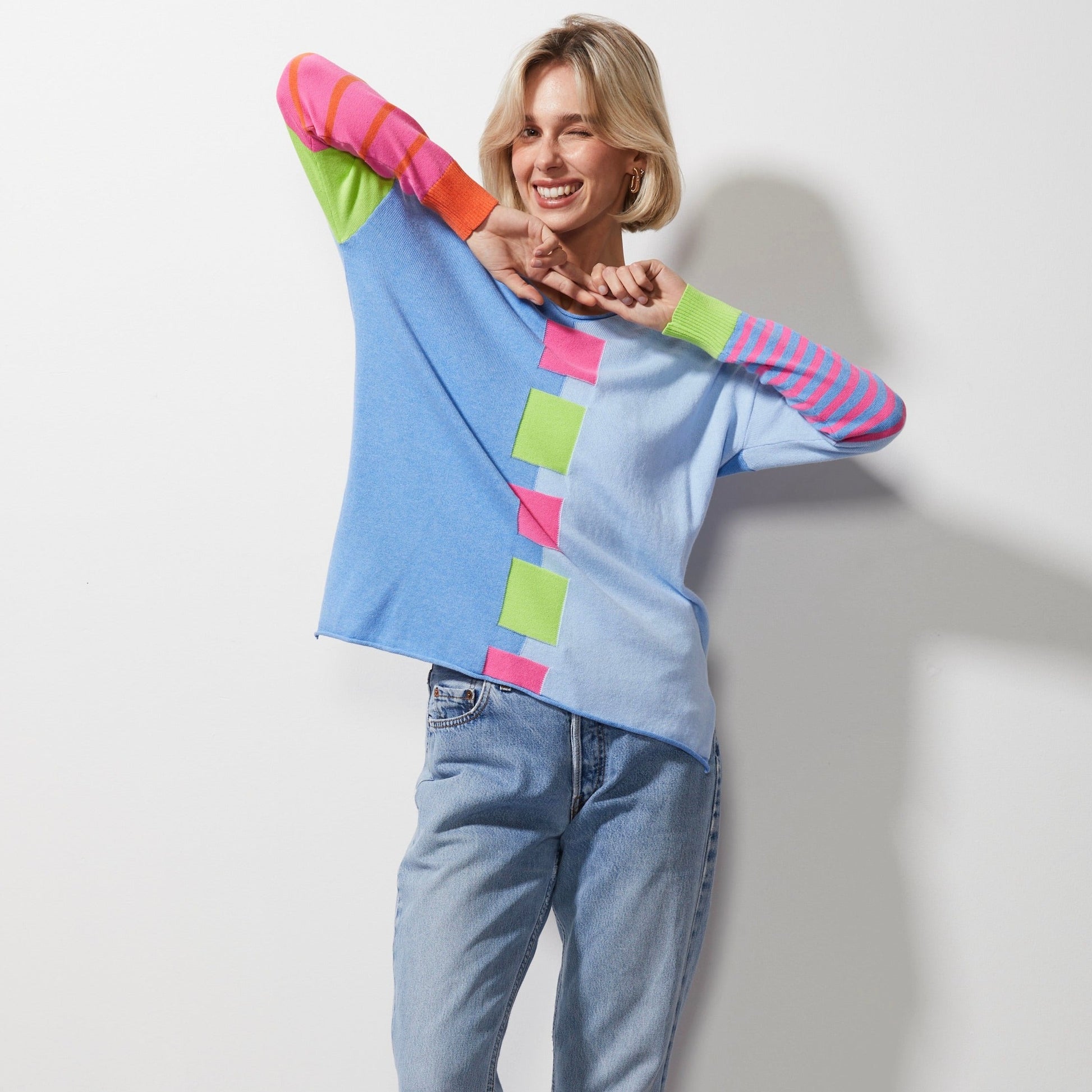 Woman wearing Zaket and Plover's Intarsia squares jumper in chambray