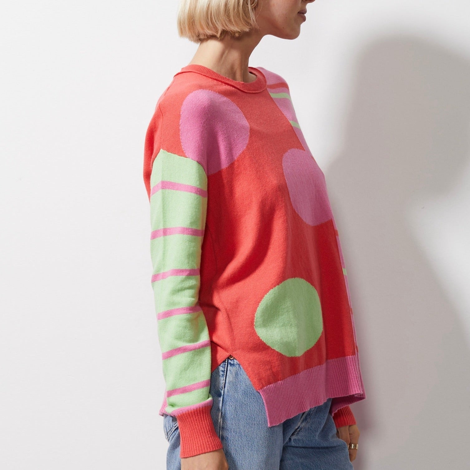 Woman wearing Spot on Stripes Jumper by Zaket and Plover in melon