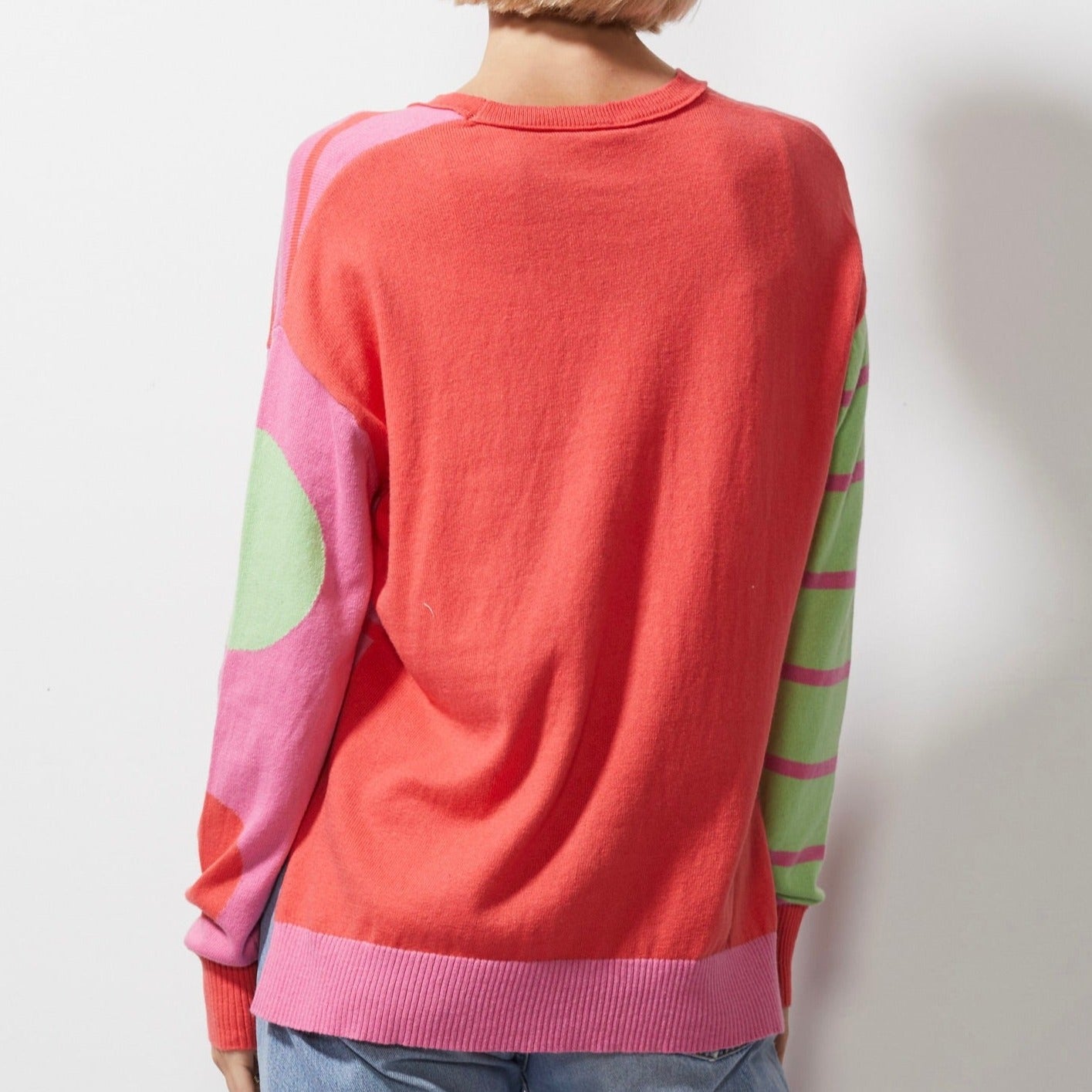 Woman wearing Spot on Stripes Jumper by Zaket and Plover in melon