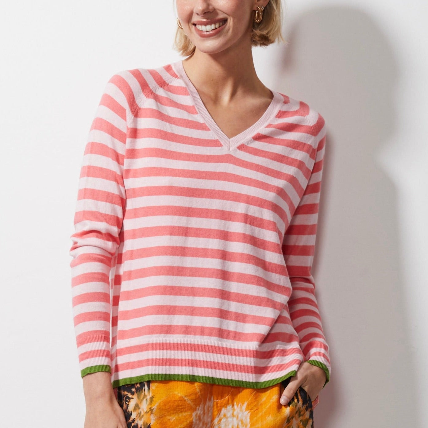 Woman wearing Zaket and Plover's Essential Stripe Vee Sweater in petal