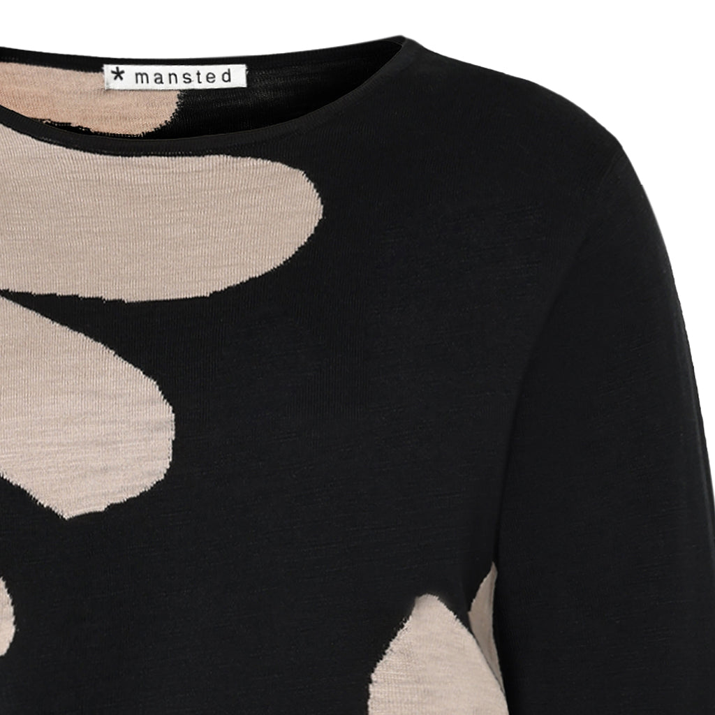 Close up of Leana floral Top in Black by Mansted for women