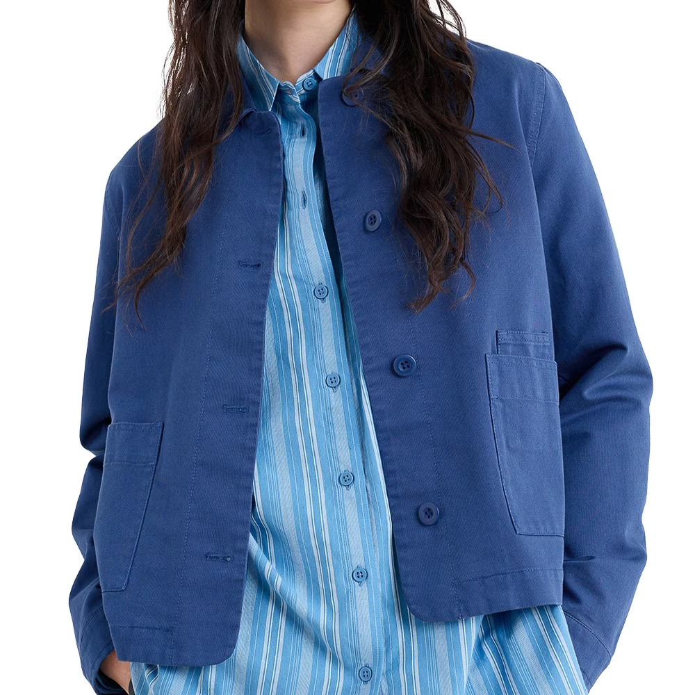 Woman wearing the Coombe Lane Cotton Jacket in Washed Marine navy