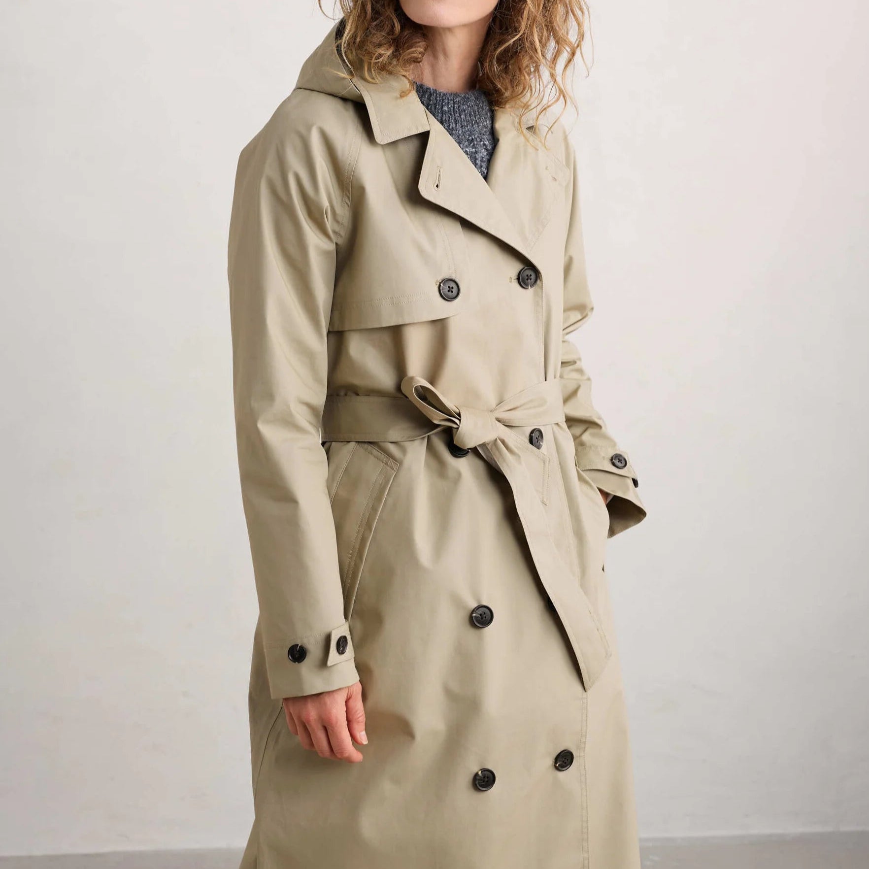 Woman wearing the Penweathers Trench Coat in natural Seed by SEASALT